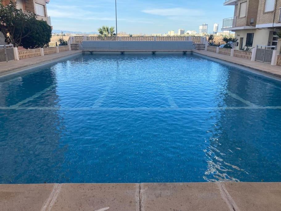 Coqueto apartamento de Playa con Piscina y Terraza Valencia Exterior foto